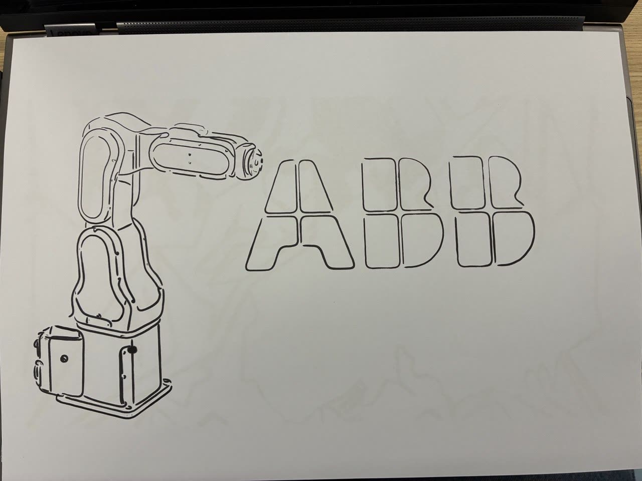 IRB 1100 line art next to the ABB logo, drawn by the robot